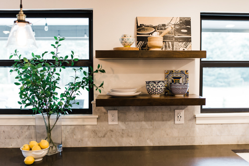 Large transitional u-shaped medium tone wood floor and brown floor eat-in kitchen photo in Phoenix with a farmhouse sink, shaker cabinets, white cabinets, quartzite countertops, gray backsplash, marble backsplash, stainless steel appliances and a peninsula