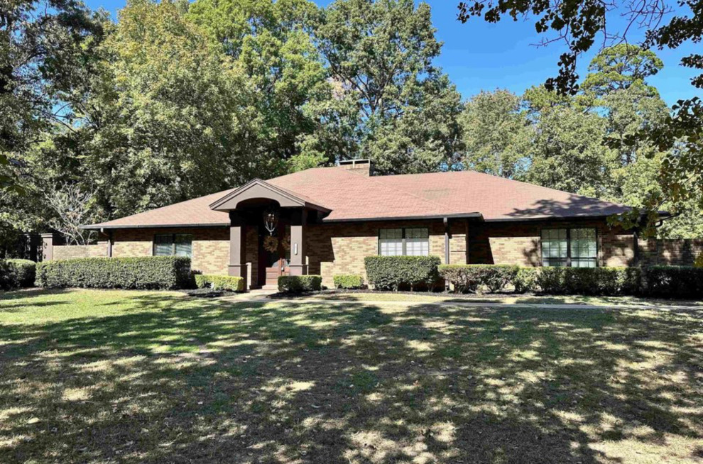 Help! Need help choosing trim color for yellow brick home!