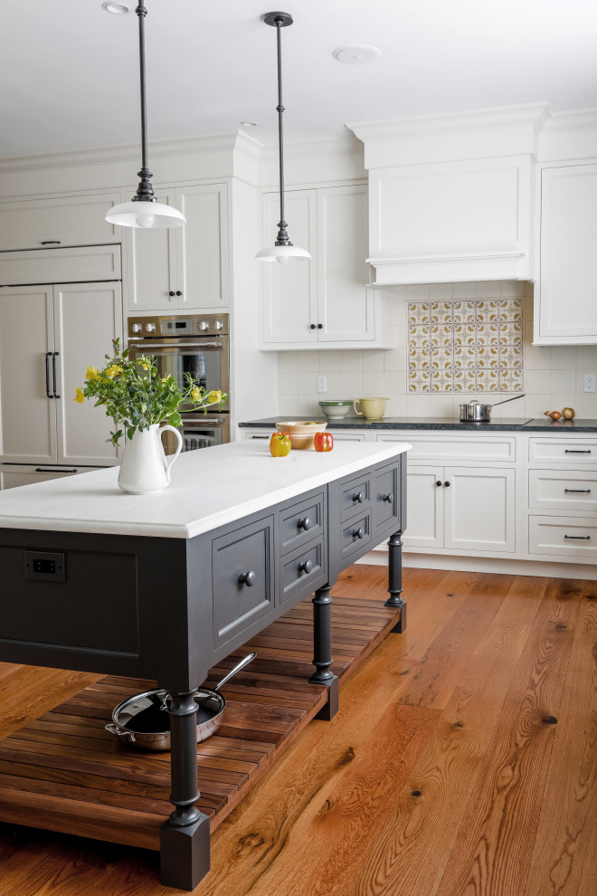 This is an example of a large country l-shaped eat-in kitchen in New York with a single-bowl sink, flat-panel cabinets, grey cabinets, marble benchtops, yellow splashback, ceramic splashback, white appliances, dark hardwood floors, with island, brown floor and white benchtop.