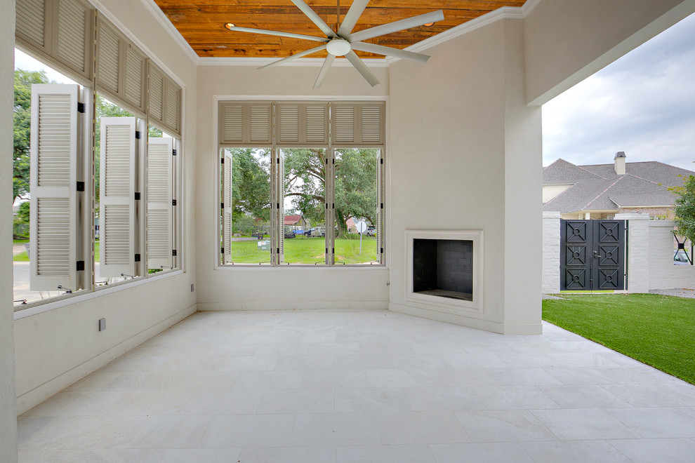 Example of a transitional home design design in New Orleans