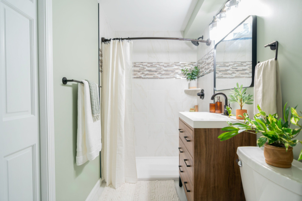 This is an example of a small traditional shower room bathroom in Minneapolis with flat-panel cabinets, medium wood cabinets, an alcove shower, a wall mounted toilet, beige tiles, ceramic tiles, blue walls, cement flooring, a submerged sink, zinc worktops, white floors, a shower curtain, white worktops, a single sink and a freestanding vanity unit.
