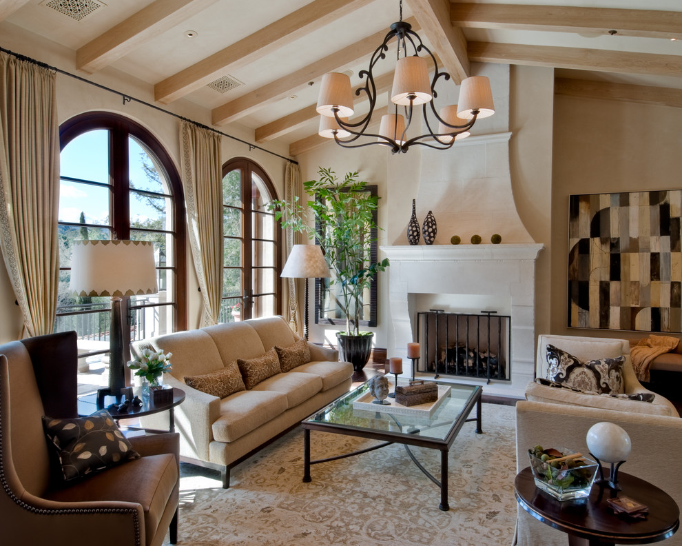 Design ideas for a large eclectic living room in San Francisco with beige walls and a standard fireplace.