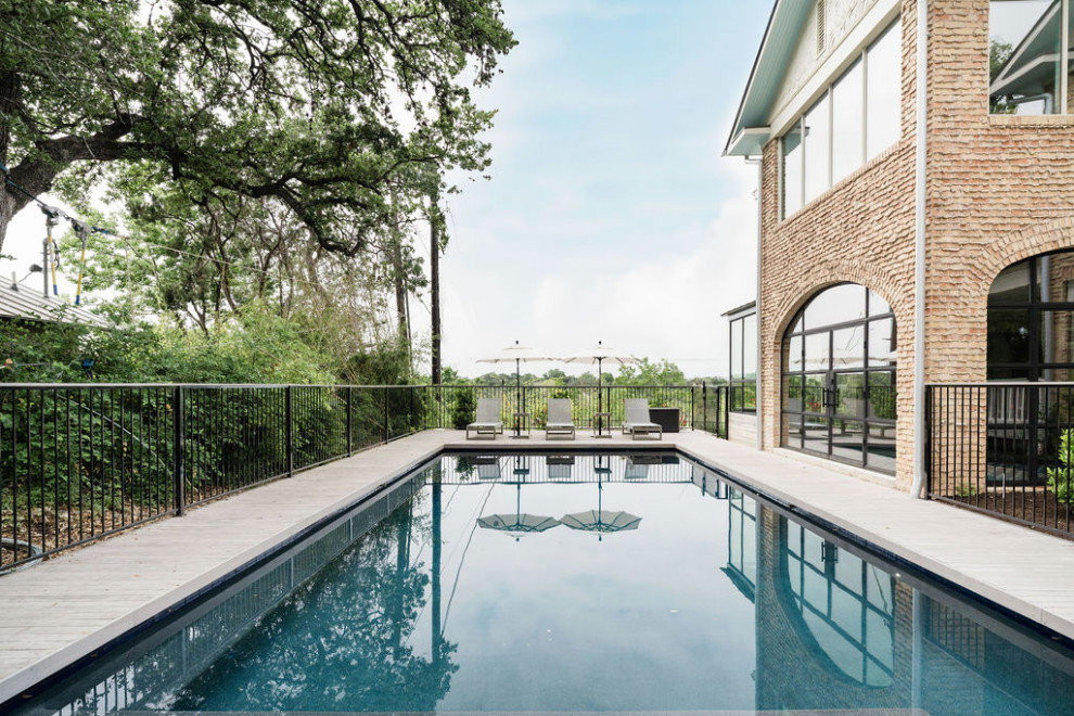 Transitional pool photo in Austin