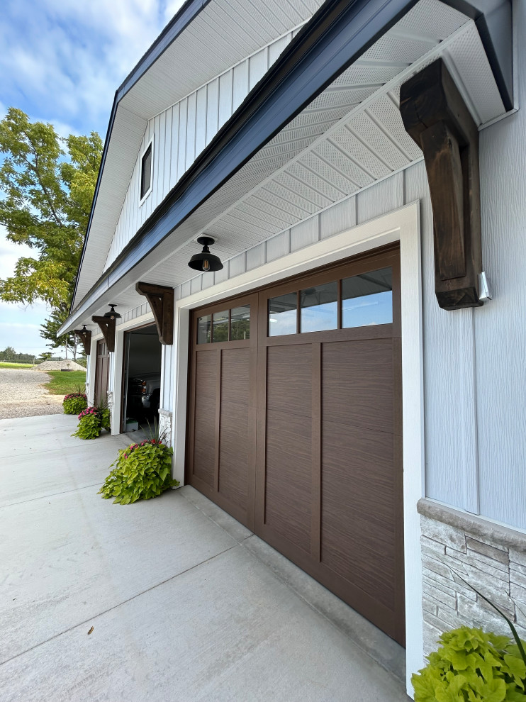 Inspiration for a farmhouse garage remodel in Other