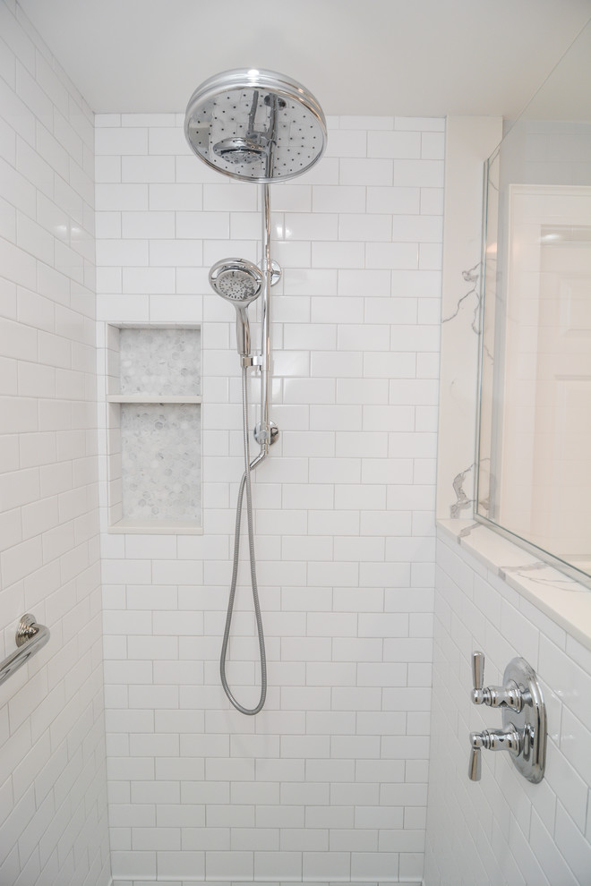 Small transitional master bathroom in Boston with recessed-panel cabinets, grey cabinets, a curbless shower, a two-piece toilet, white tile, subway tile, grey walls, marble floors, an undermount sink, solid surface benchtops, grey floor, an open shower and green benchtops.