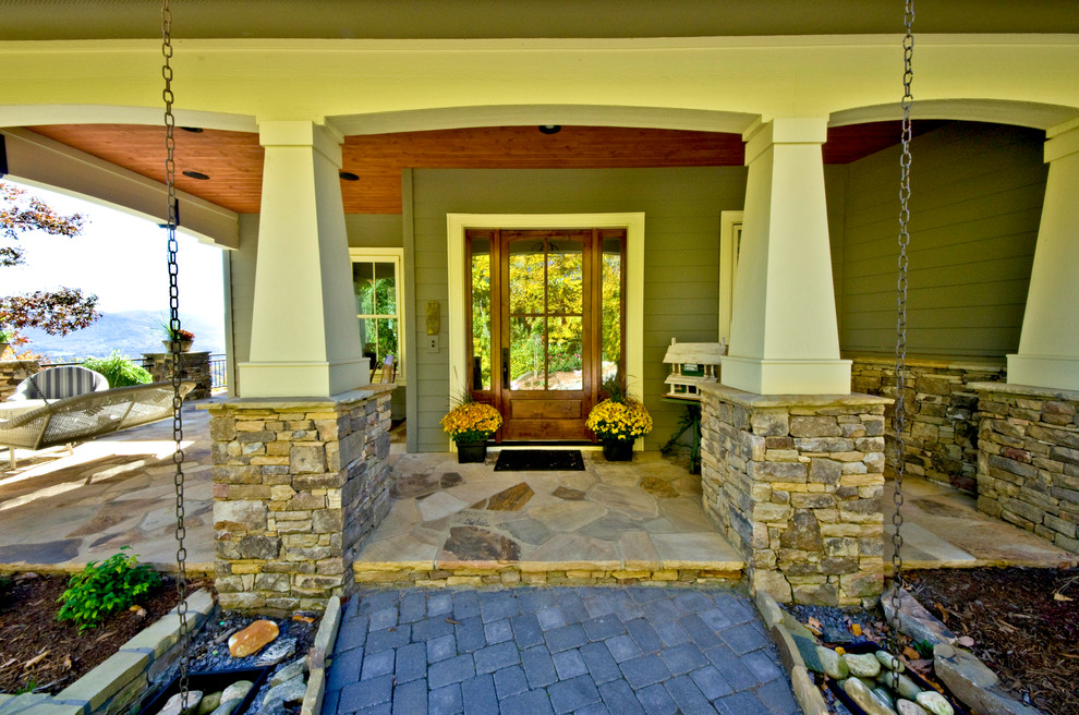 Photo of an arts and crafts entryway in Other with a single front door.