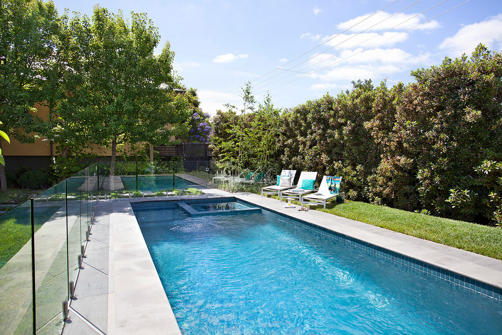 Mid-sized contemporary backyard rectangular pool in Melbourne.