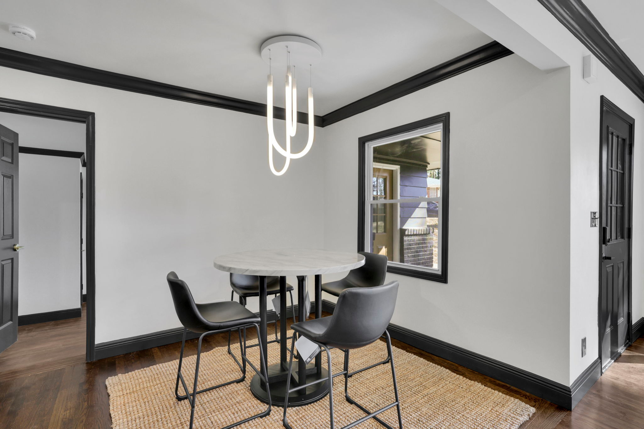 Example of a minimalist dining room design in Atlanta