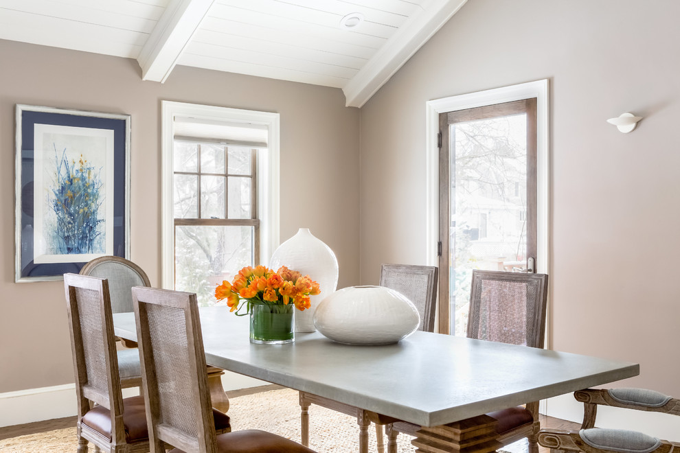 Inspiration for a traditional dining room in Boston with beige walls.