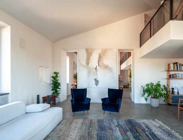 Attico a Trastevere - Aperture simmetriche verso la grande cucina minimalistisch-wohnzimmer