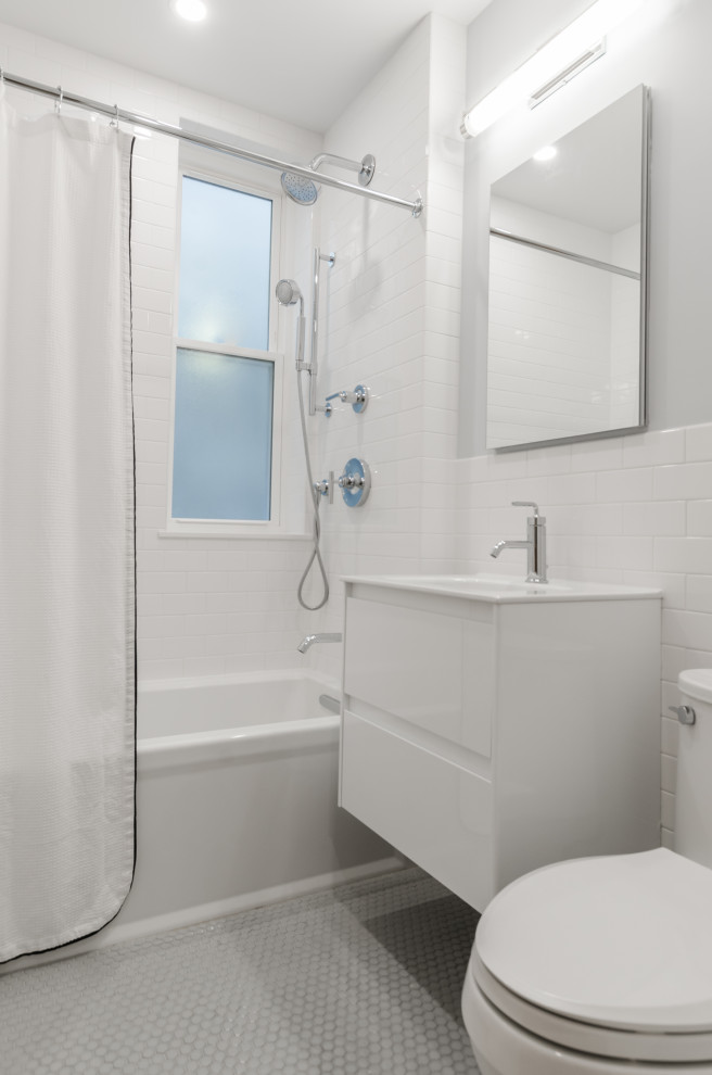 This is an example of a small modern master bathroom in New York with raised-panel cabinets, an alcove tub, a shower/bathtub combo, a one-piece toilet, white tile, subway tile, grey walls, ceramic floors, a console sink, white floor, a shower curtain, white cabinets, solid surface benchtops and white benchtops.
