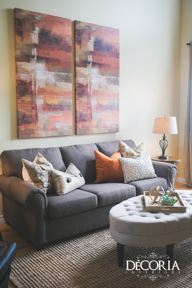 Inspiration for a small transitional formal and open concept light wood floor and beige floor home design remodel with beige walls, a standard fireplace and a tv stand