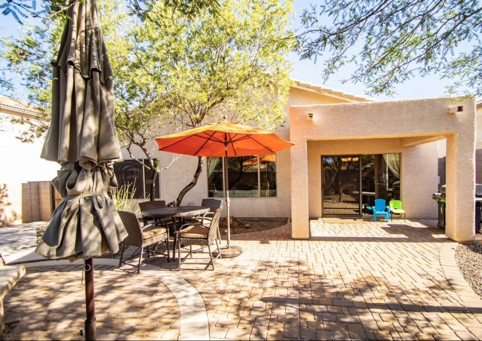 Example of a small mountain style home design design in Phoenix