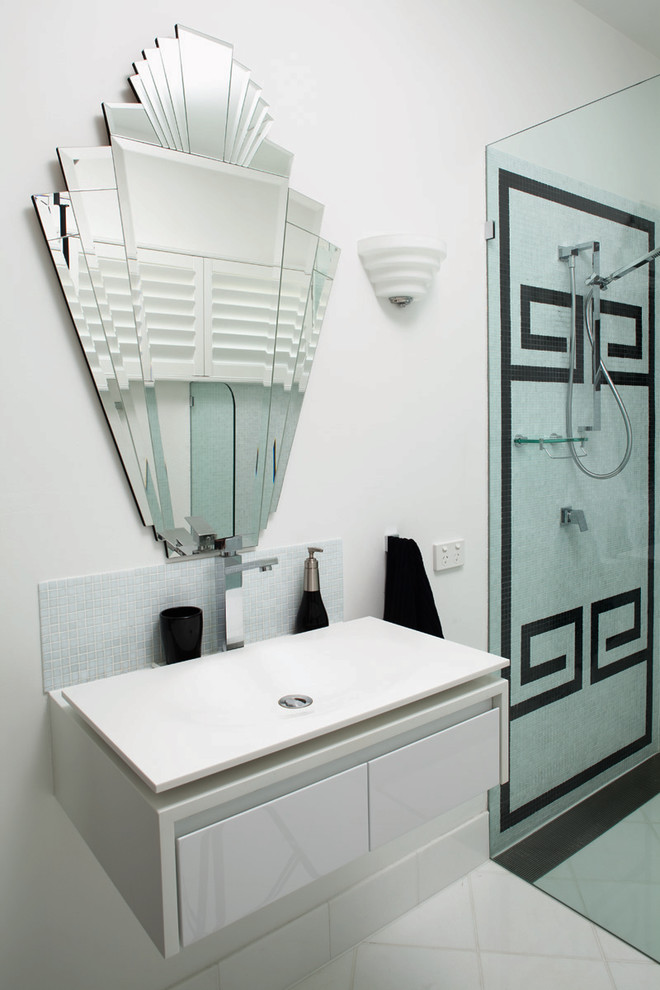 Design ideas for a contemporary bathroom in Melbourne with a vessel sink and white cabinets.