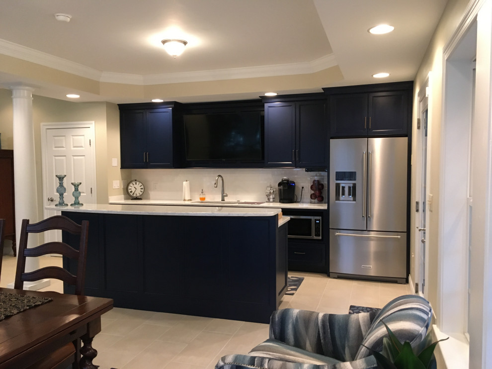 Example of a large transitional walk-out ceramic tile and beige floor basement design in Columbus