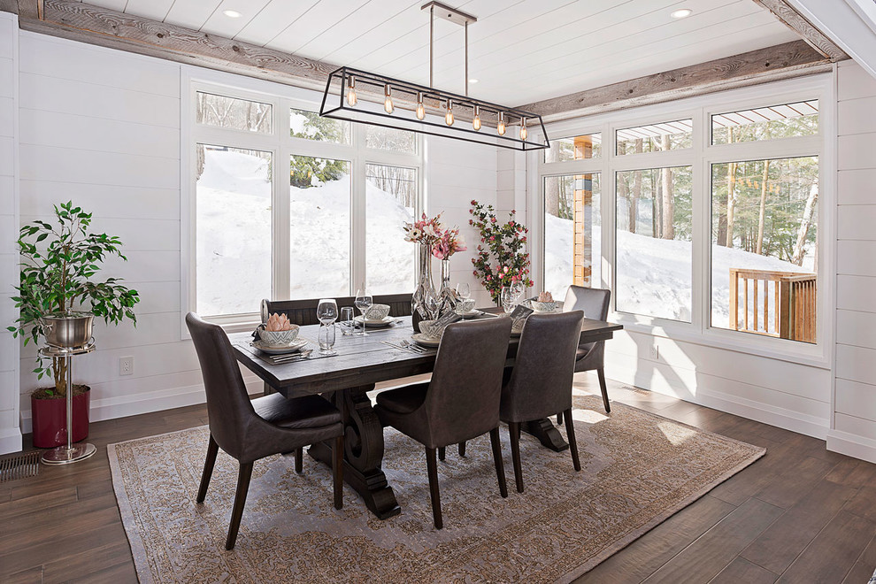Inspiration for a country dining room in Toronto with beige walls, medium hardwood floors and brown floor.