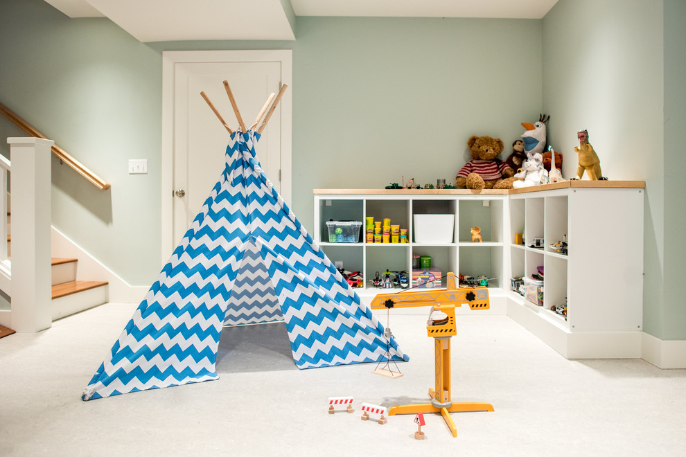 Photo of an arts and crafts gender-neutral kids' playroom for kids 4-10 years old in Seattle with green walls and white floor.