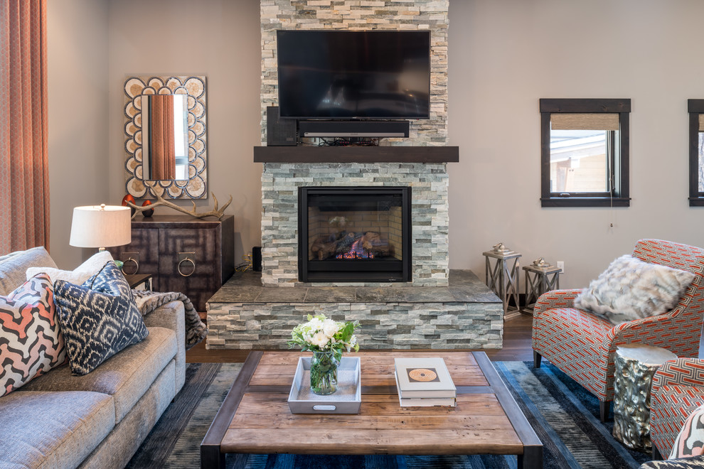 Inspiration for a transitional formal open concept living room in Other with a standard fireplace and a wall-mounted tv.
