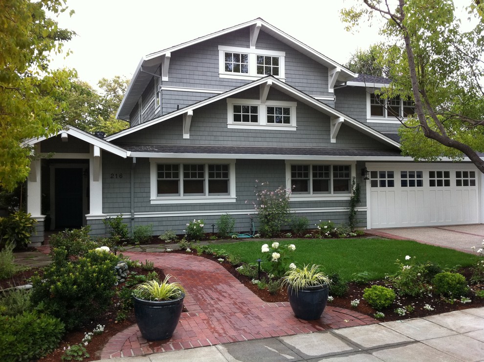 Design ideas for a mid-sized traditional two-storey exterior in San Francisco with wood siding and a gable roof.