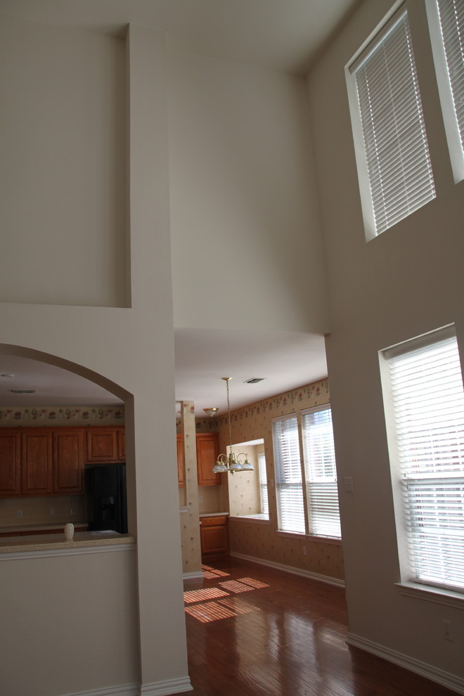 Need help to make high ceiling family room feels cozy