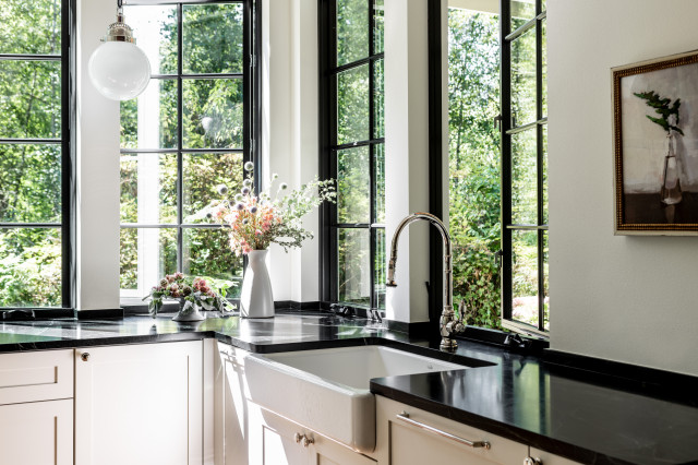 Black Casement Windows Above Kitchen Sink Complement Dark-Colored Island