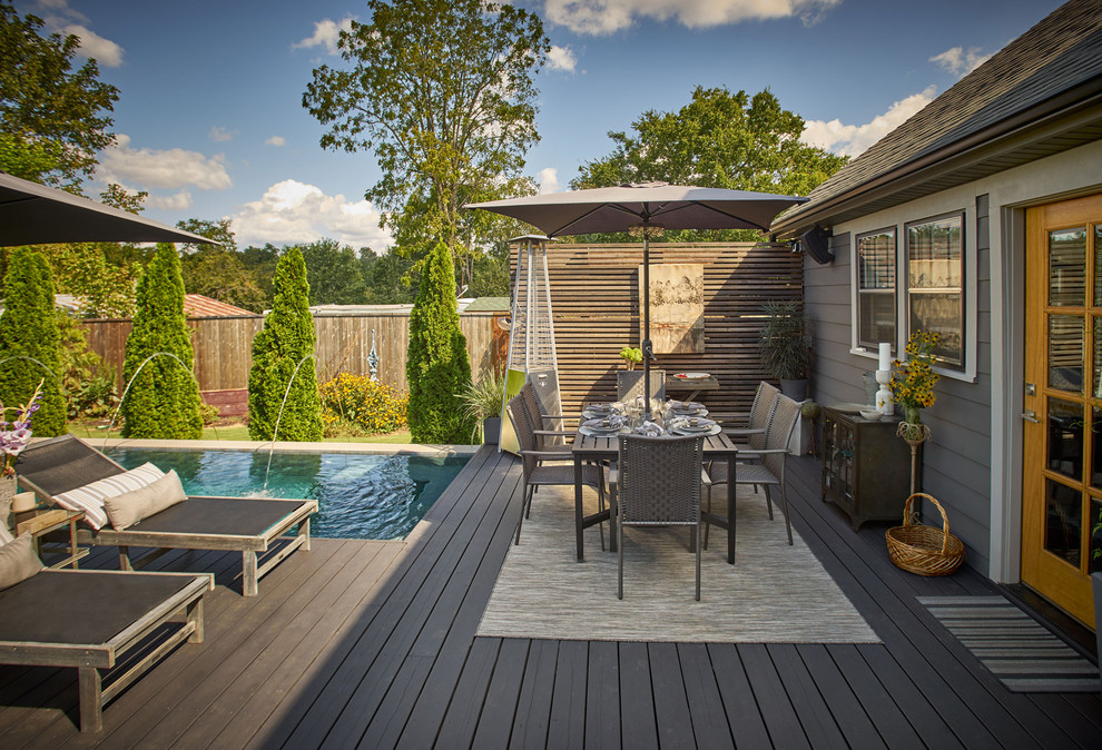 Design ideas for a small transitional backyard deck in Other with a water feature and no cover.