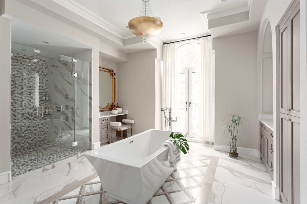 Inspiration for a large ensuite bathroom in Vancouver with shaker cabinets, grey cabinets, a freestanding bath, an alcove shower, white walls, porcelain flooring, marble worktops, white floors, a hinged door, white worktops, double sinks, a built in vanity unit and a coffered ceiling.