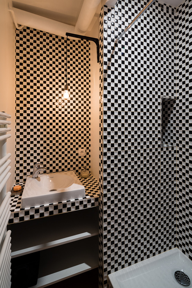 Inspiration for a small contemporary 3/4 bathroom in Lyon with a vessel sink, open cabinets, white walls, mosaic tile, white cabinets and black and white tile.