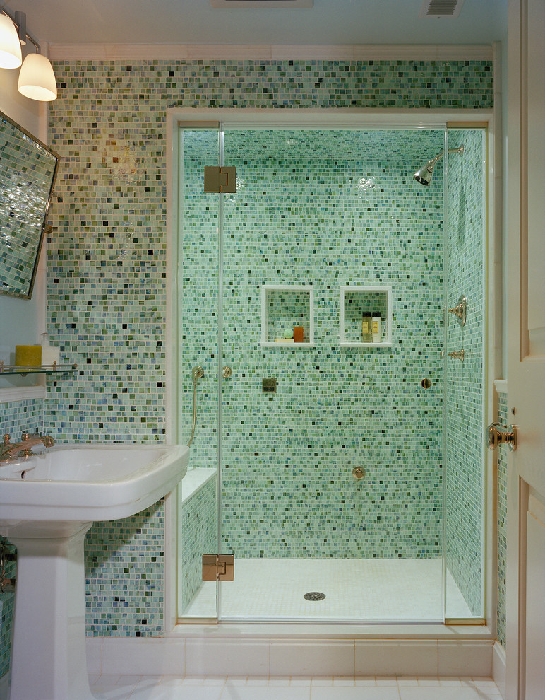 This is an example of a small traditional bathroom in DC Metro with a pedestal sink, an alcove shower, multi-coloured tile, ceramic floors and mosaic tile.