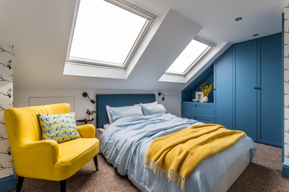 Small transitional kids' room photo in London with blue walls