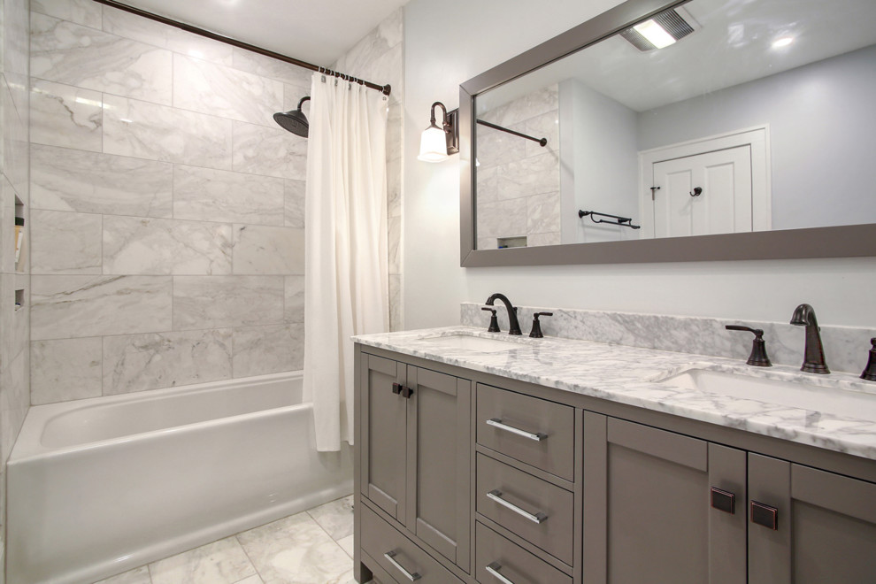 Small traditional master bathroom in New Orleans with shaker cabinets, grey cabinets, an alcove tub, a shower/bathtub combo, white tile, metal tile, white walls, marble floors, an undermount sink, marble benchtops, white floor, a shower curtain and white benchtops.