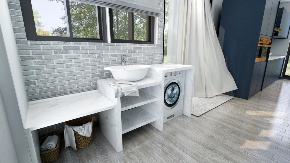 Modern single-wall laundry room in Other with a single-bowl sink, open cabinets, marble benchtops, grey splashback, brick splashback, grey walls, laminate floors, an integrated washer and dryer, grey floor and white benchtop.