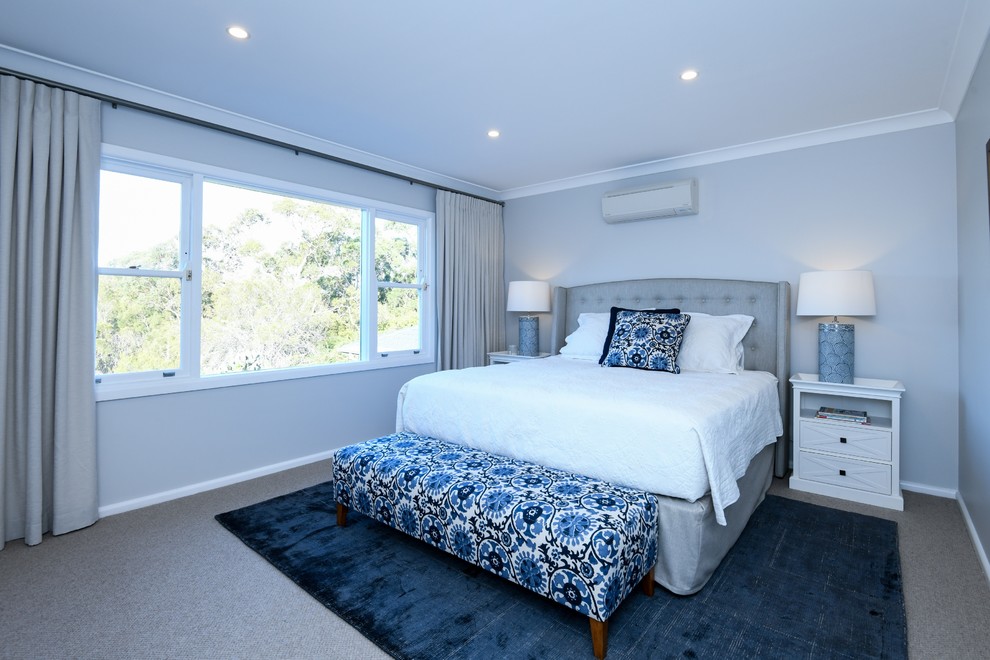 Large contemporary master bedroom in Sydney.