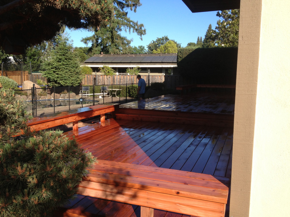 This is an example of a mid-sized arts and crafts backyard deck in San Francisco.