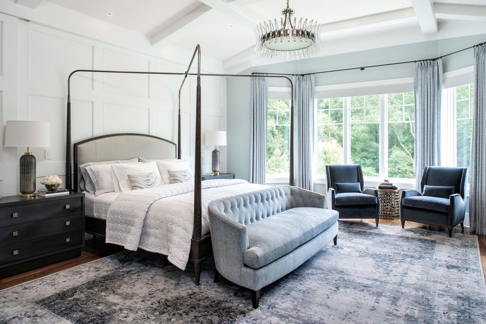 This is an example of a large transitional master bedroom in DC Metro with white walls.