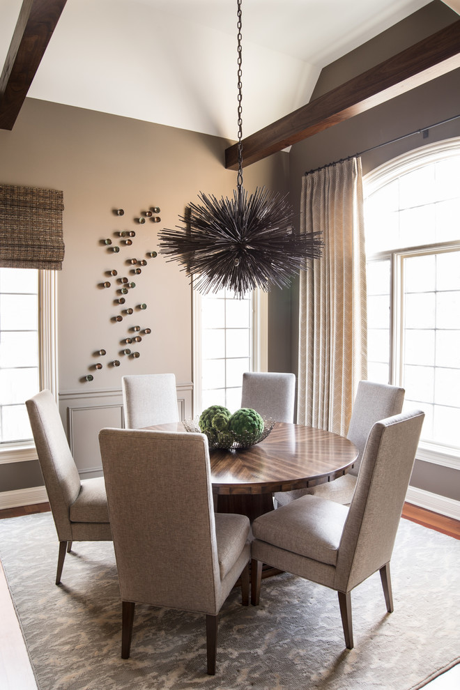 Inspiration for an eclectic dining room in Chicago with grey walls.