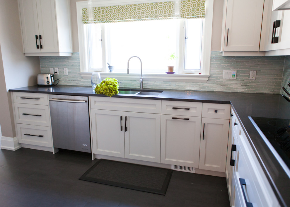 Example of a transitional kitchen design in Toronto