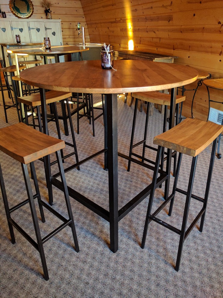 Inspiration for a rustic dining room remodel with brown walls