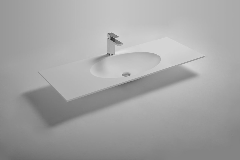 Solid surface vs glass vs porcelain for integrated basin top