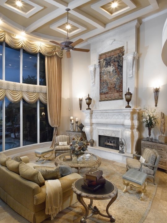 Design ideas for a large traditional formal enclosed living room in Miami with white walls, ceramic floors, a standard fireplace, a plaster fireplace surround and no tv.