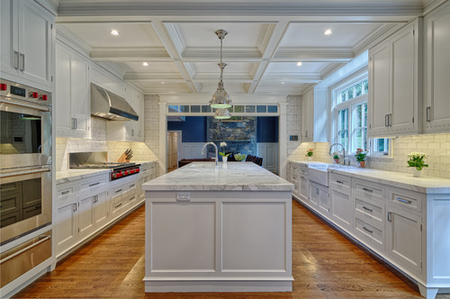 A traditional kitchen featuring beautiful Calacatta Gold marble 