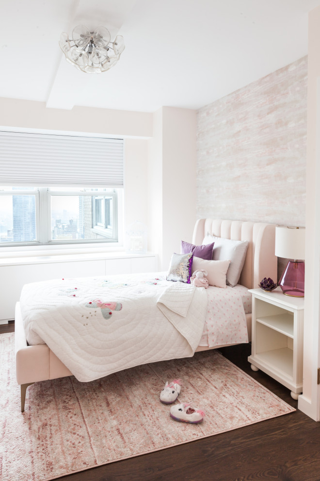 Manhattan Apartment Renovation - Inspiration for a bedroom and mid-sized contemporary girl medium tone wood floor and brown floor childrens' room remodel in New York with pink walls