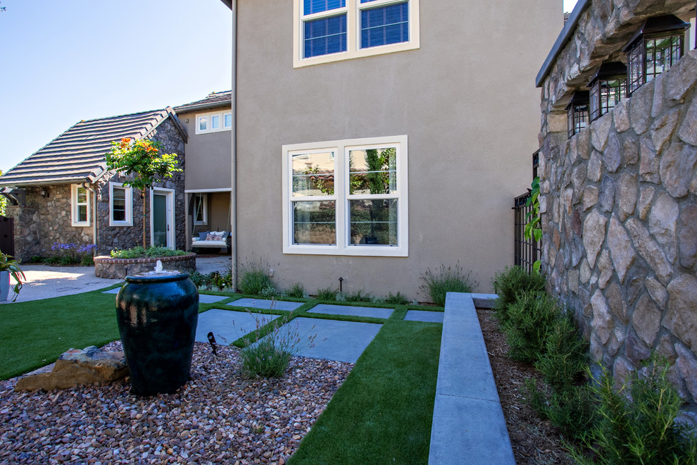 This is an example of a large transitional courtyard landscaping.