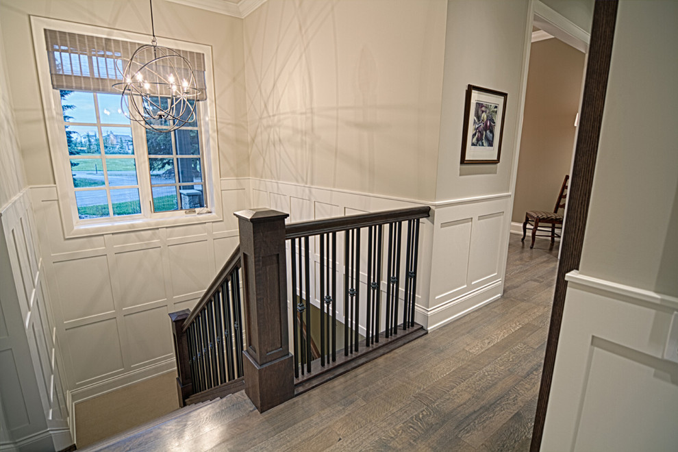 Transitional home design photo in Calgary