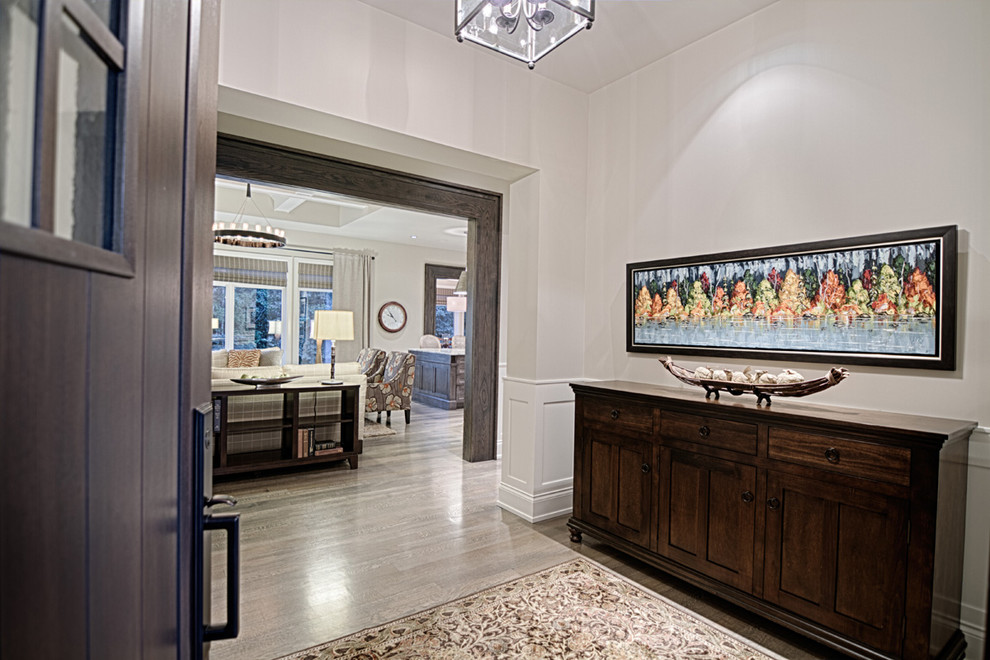 Transitional home design photo in Calgary