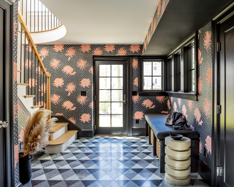 Mudroom - transitional porcelain tile, gray floor and wallpaper mudroom idea in New York with black walls and a black front door