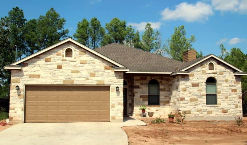Example of a transitional home design design in Austin