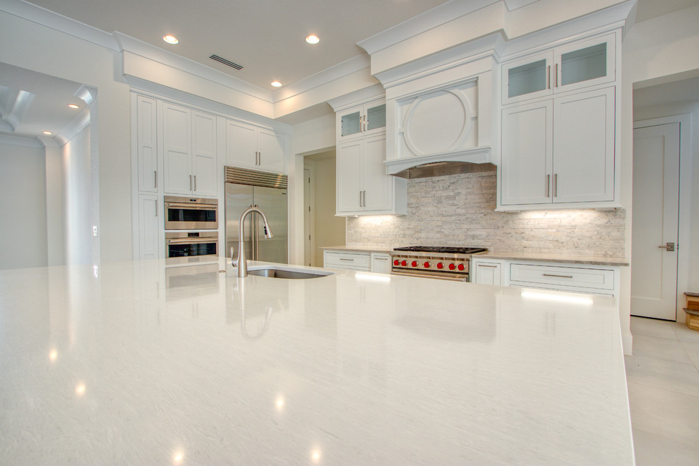 Example of a transitional kitchen design in Miami