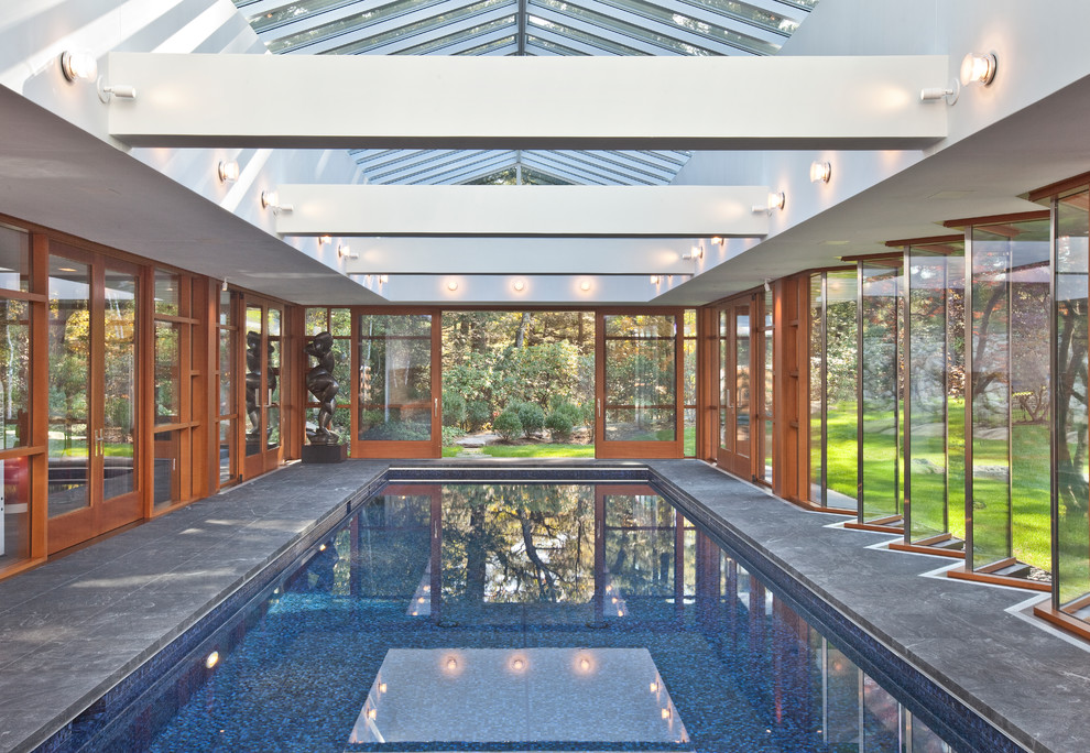 Inspiration for an indoor stone and rectangular lap pool remodel in Boston