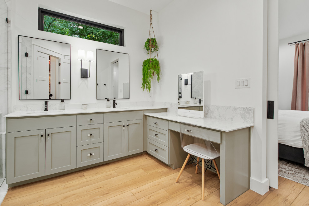 Inspiration for a mid-sized scandinavian master white tile and porcelain tile vinyl floor and double-sink bathroom remodel in Dallas with shaker cabinets, gray cabinets, a one-piece toilet, white walls, an undermount sink, quartz countertops, a hinged shower door, white countertops and a built-in vanity
